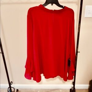 ELOQUII Blouse with Ruffle sleeves.